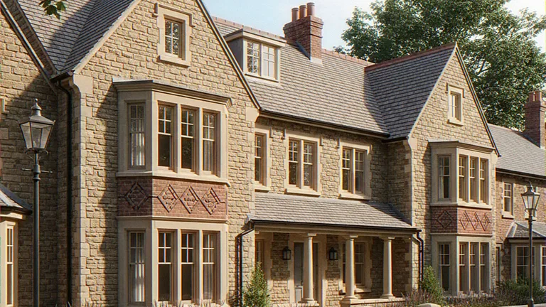 Exterior CGI of stone townhouses with two-storey bay windows and brick diaper panels