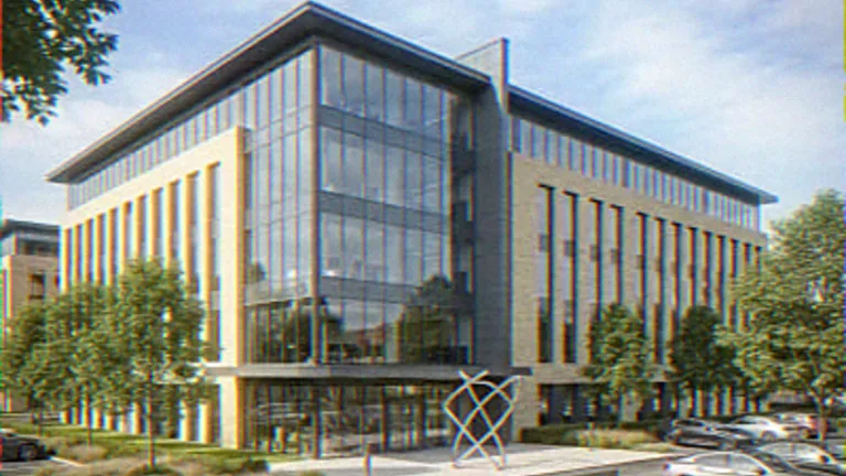 Exterior CGI of an office building with a glazed corner atrium above landscaped lawns