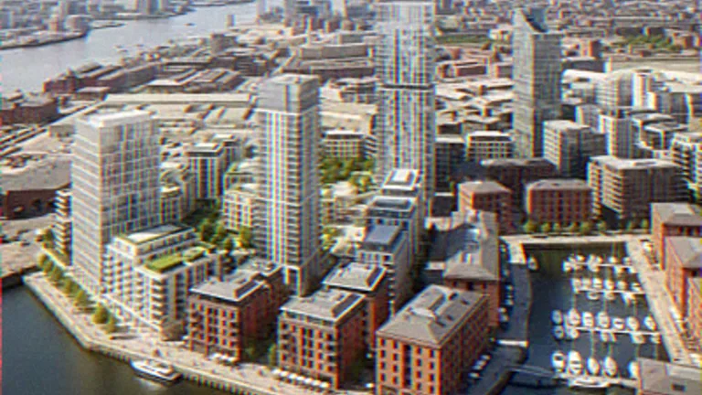 Aerial CGI of a waterfront masterplan with residential towers around a marina basin